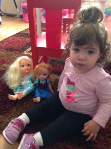 baby with frozen dolls